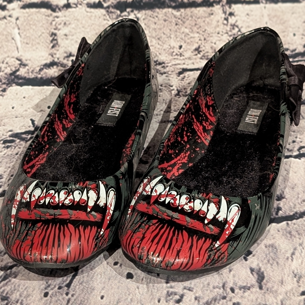 Iron Fist Red and Black Flats with Bold Graphic Design